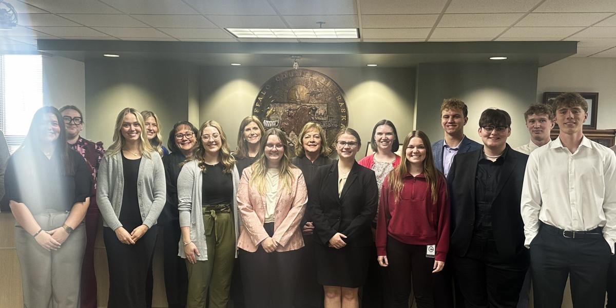 Judge Riko Bishop, Chief Judge Francie Riedmann, Judge Frankie Moore, and Judge Moore’s judicial law clerk, Claudia Brock with students enrolled in the Kearney Law Opportunities Program.