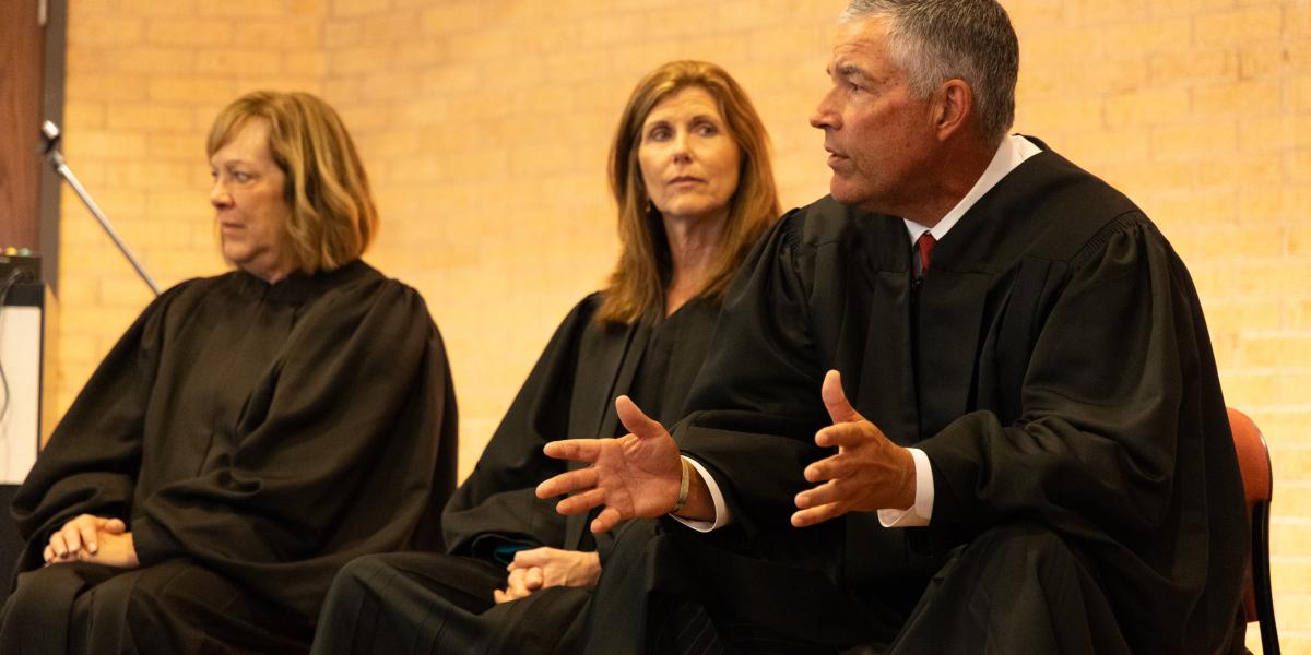 Judges Moore, Riedmann, Welch