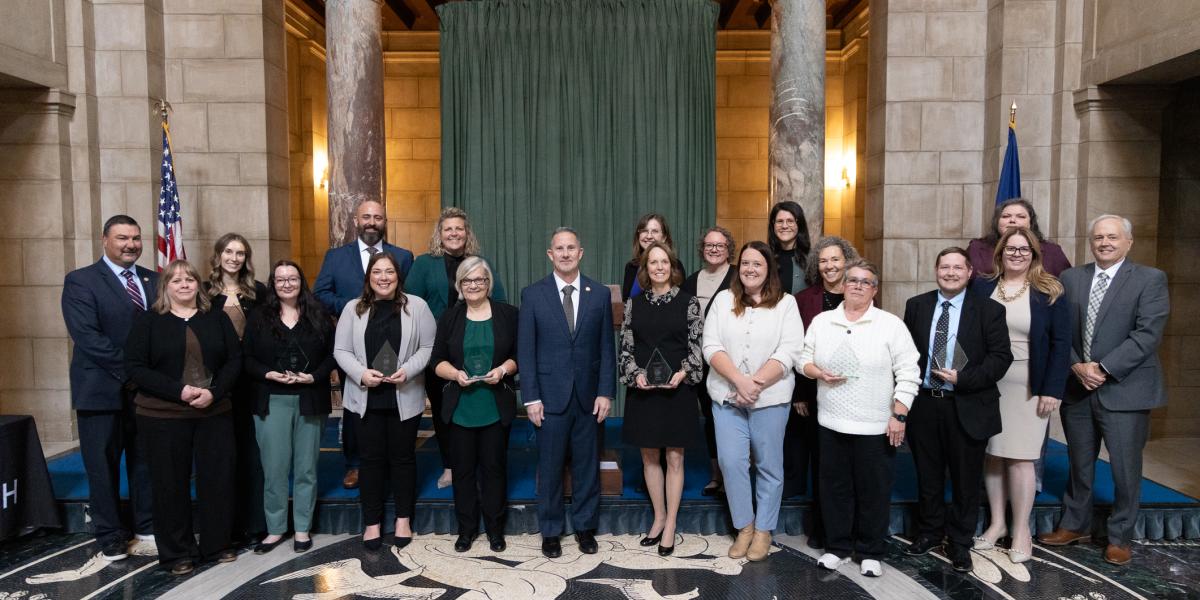 Back row: Corey Steel, Kasey Stallbaum, Scott Lord, Ashley Laux, Mary Pat Coe, Stephanie Volkmer, Theresa Cusic, Deb VanDyke-Ries, Kari Corkle, and Gene Cotter.  Front row: Annette Shafer, Sarah Acri, Megan Perkins, Jeanine Hrdlicka, Chief Justice Jeffrey Funke, Wendy Dethlefs, Jordan Hernandez, Traci Webber, Theo Raumaker, and Kathleen Valle.