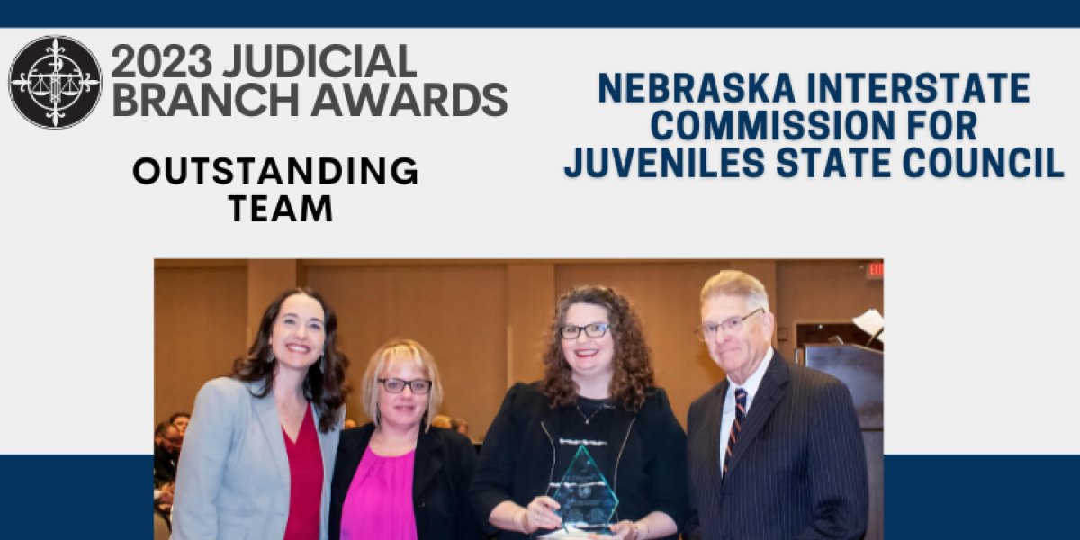 Photo: Kari Rumbaugh, Abbie Christian (award nominator), Jacey Rader, and Chief Justice Mike Heavican.