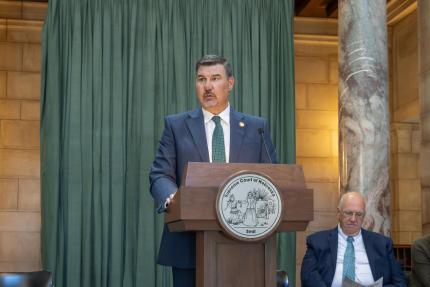 Nebraska State Court Administrator Corey Steel speaks during award ceremony