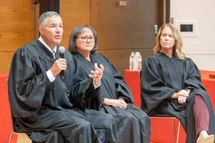 Judges Lawrence Welch, Riko Bishop, and PaTricia Freeman answer student questions following the afternoon session.