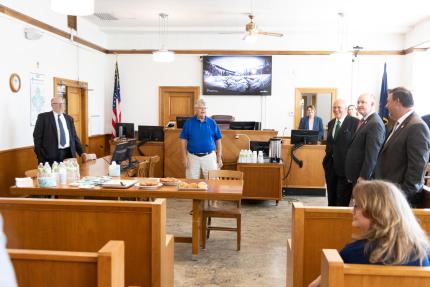 Retired Judge Carlton Clark discusses the Gosper County courthouse with Judge Jeffrey Wightman (left).