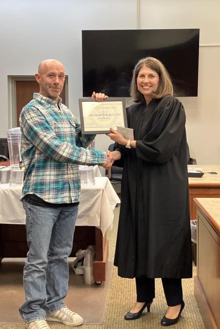 Judge Tina Marroquin and graduate Christopher Pullen