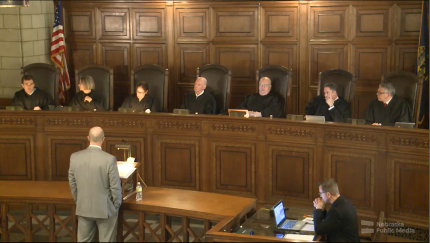 District Judge Geoffrey C. Hall sits with Nebraska Supreme Court