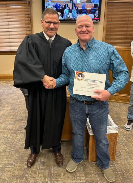 Judge John Marsh with graduate Richard