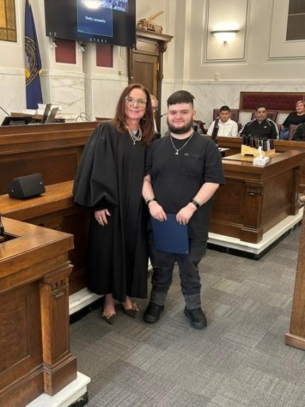 Photos: Judge Shelly Stratman with Graduates Jah and Adrian.