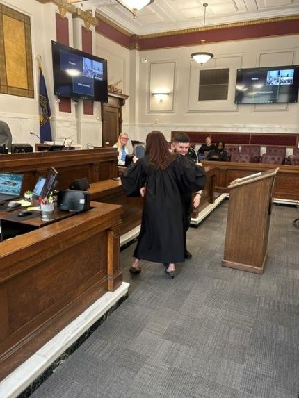 Photos: Judge Shelly Stratman with Graduates Jah and Adrian.