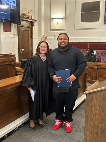 Photos: Judge Shelly Stratman with Graduates Jah and Adrian.
