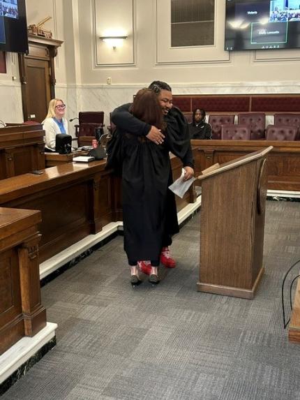 Photos: Judge Shelly Stratman with Graduates Jah and Adrian.