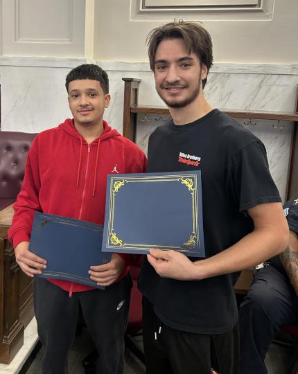 Graduates Gabriel and Michael.