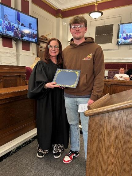 Photos: Judge Shelly Stratman with Graduates.