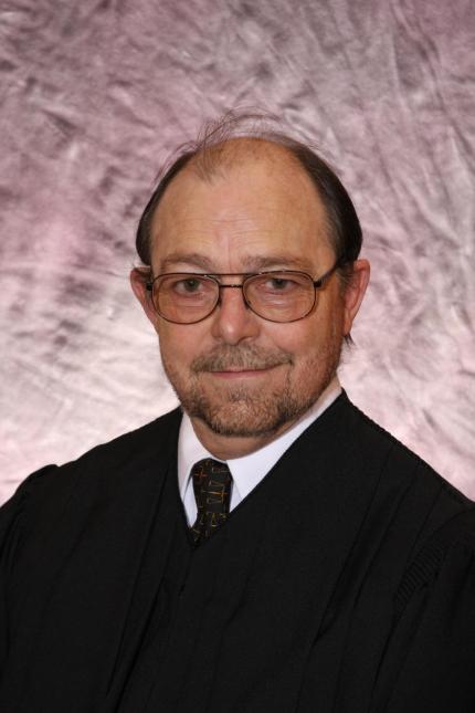 Hon. Alan G. Gless