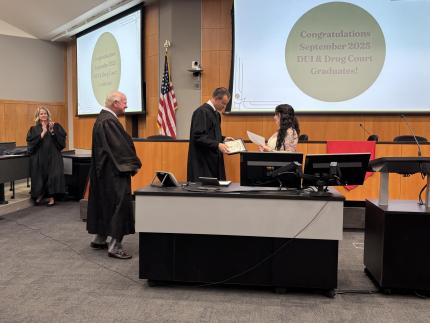 Judge Ryan Post with Graduate.