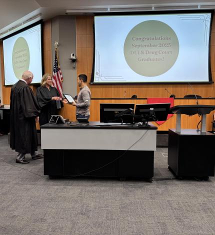 Judge Darla Ideus and Judge Colborn with Graduate.