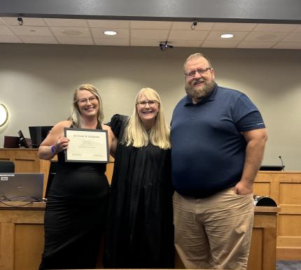 Graduate Amber, Judge Rachel Daugherty, and Problem-Solving Court Officer Kyle Hohnholt.