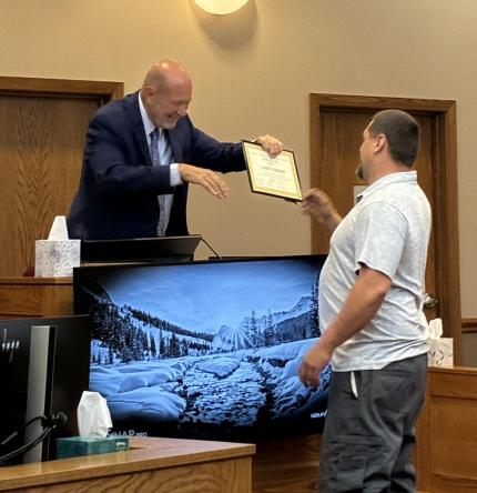 Judge Michael Piccolo and Graduate Leroy