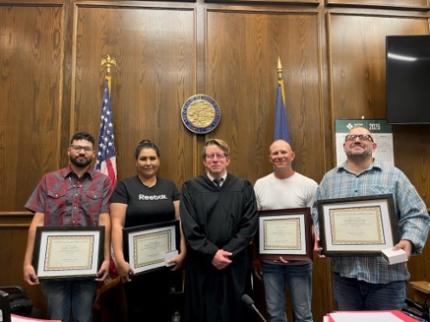 Top Photo (L to R): Graduate Joel, graduate Jessica, Judge Ryan Stover, graduate Cody, graduate Jerimiah.