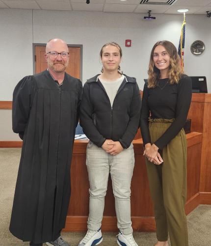 Photo: Judge Jonathan Crosby with graduate Jeremiah, and Probation Officer Kasey Stallbaum.