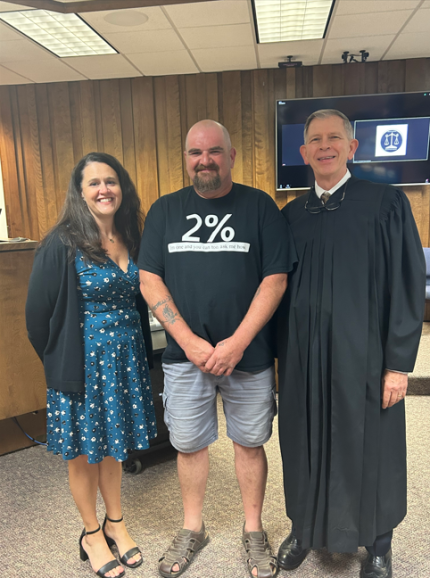 Probation Officer Brandi Baldassano, graduate Brian, and Judge James Stecker.
