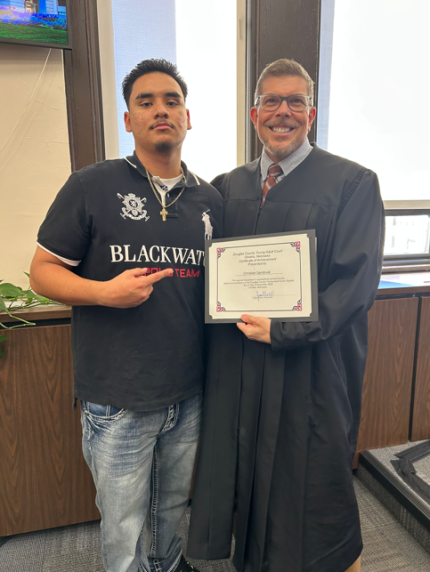 Judge James Masteller with graduate