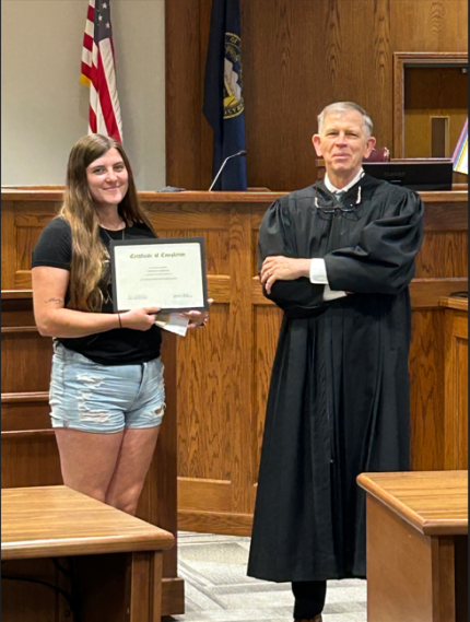Photo: Graduate Serenity with Judge James Stecker.