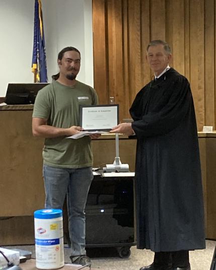 Judge Stecker with graduate, Preston.