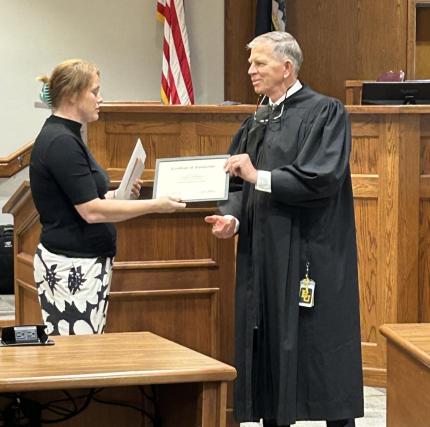 Photo: Graduate Elizabeth with Judge James Stecker.