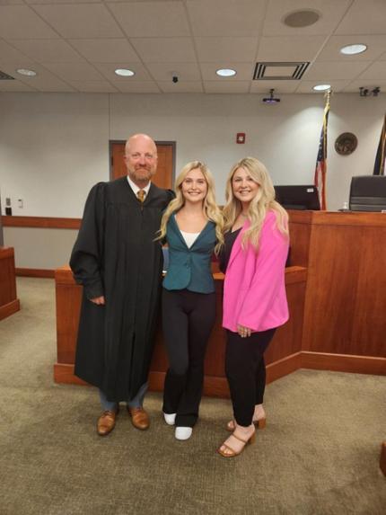 judge and graduates