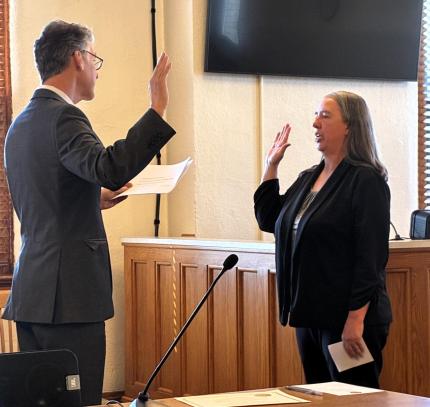 Photo: Clerk Magistrate Ashley Harimon sworn-in by Judge Paul Wess.