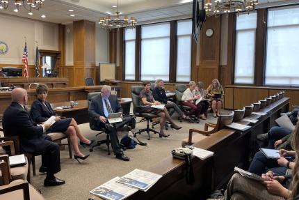 Douglas and Sarpy judges and staff prepare for discussion with Omaha area journalists during March 2025 lunch meeting.