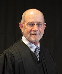 Hon. Mark D. Kozisek