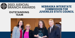 Photo: Kari Rumbaugh, Abbie Christian (award nominator), Jacey Rader, and Chief Justice Mike Heavican.