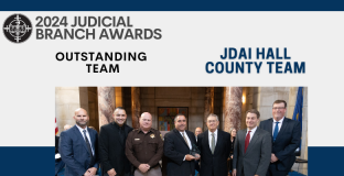 Photo, from left: Marc Kohmetscher, James Schulte, Sheriff Rick Conrad, Martin Klein, former Chief Justice Mike Heavican, Judge Alfred Corey, and Judge Brian McQuay.