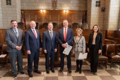 State Court Administrator Corey Steel, Justice Jason Bergevin, Chief Justice Jeffrey Funke, Judge David Bargen, Judge Holly Parsley, Deputy Administrator for Court Services Amy Prenda